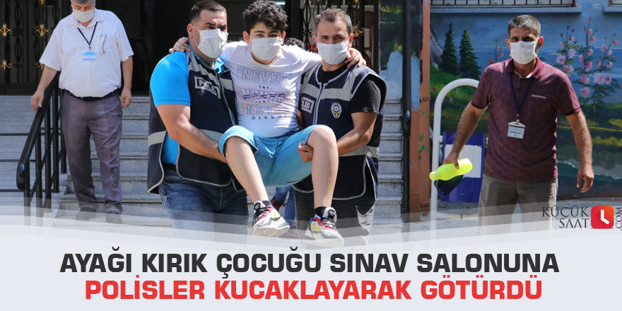 Ayağı kırık çocuğu sınav salonuna polisler kucaklayarak götürdü