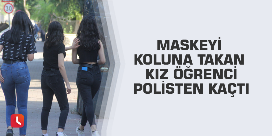 Maskeyi koluna takan kız öğrenci polisten kaçtı