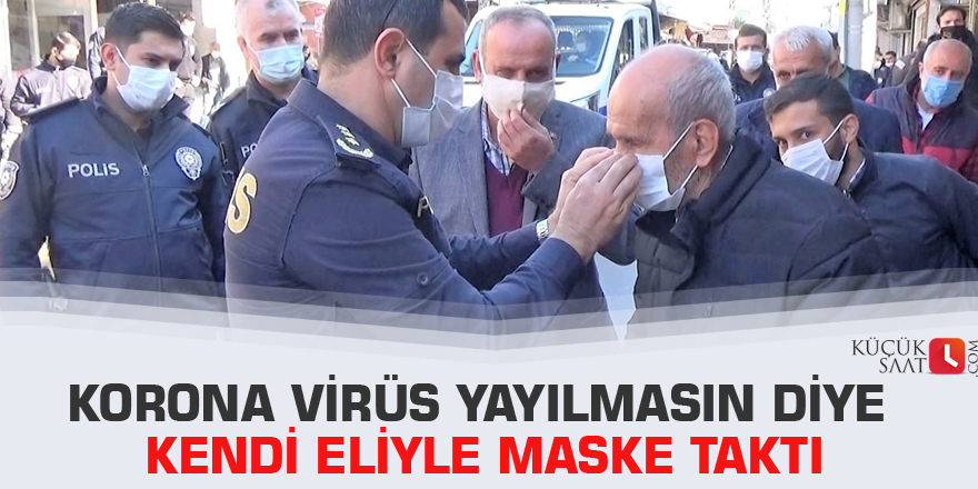 Korona virüs yayılmasın diye kendi eliyle maske taktı