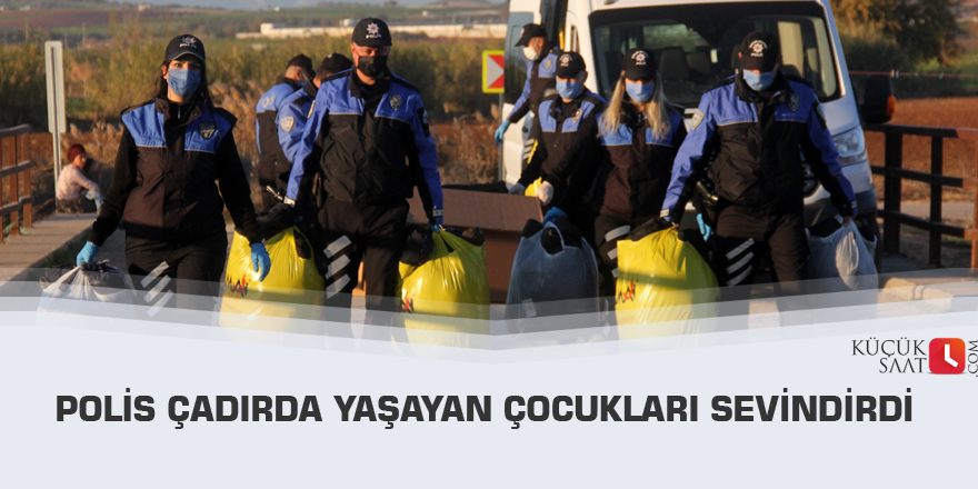 Polis çadırda yaşayan çocukları sevindirdi