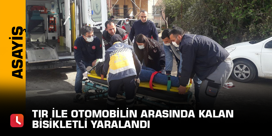 Tır ile otomobilin arasında kalan bisikletli yaralandı