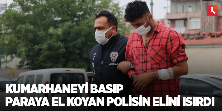 Kumarhaneyi basıp paraya el koyan polisin elini ısırdı