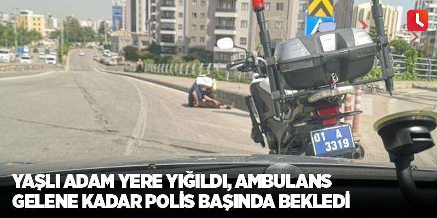 Yaşlı adam yere yığıldı, ambulans gelene kadar polis başında bekledi