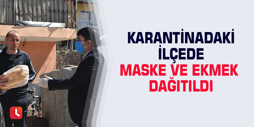 Karantinadaki ilçede maske ve ekmek dağıtıldı