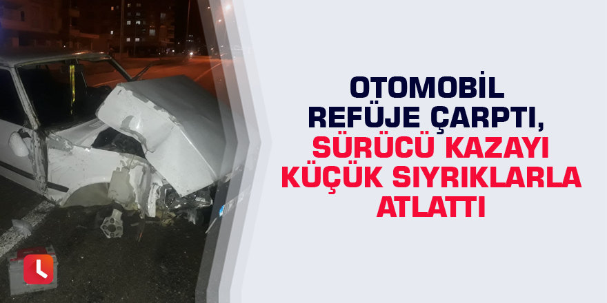 Otomobil refüje çarptı, sürücü kazayı küçük sıyrıklarla atlattı