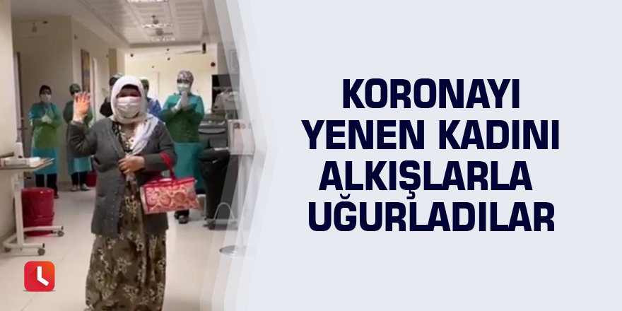 Koronayı yenen kadını alkışlarla uğurladılar