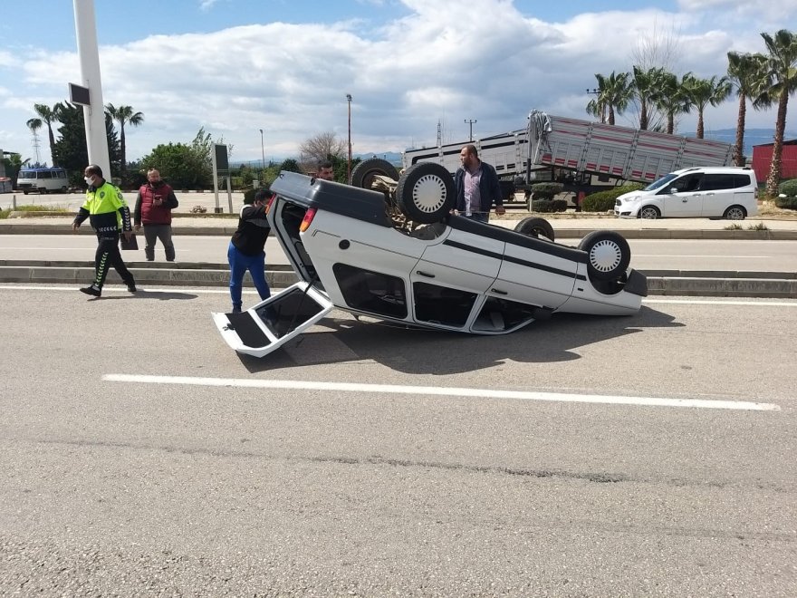 Takla atan otomobilden hafif yaralı kurtuldu